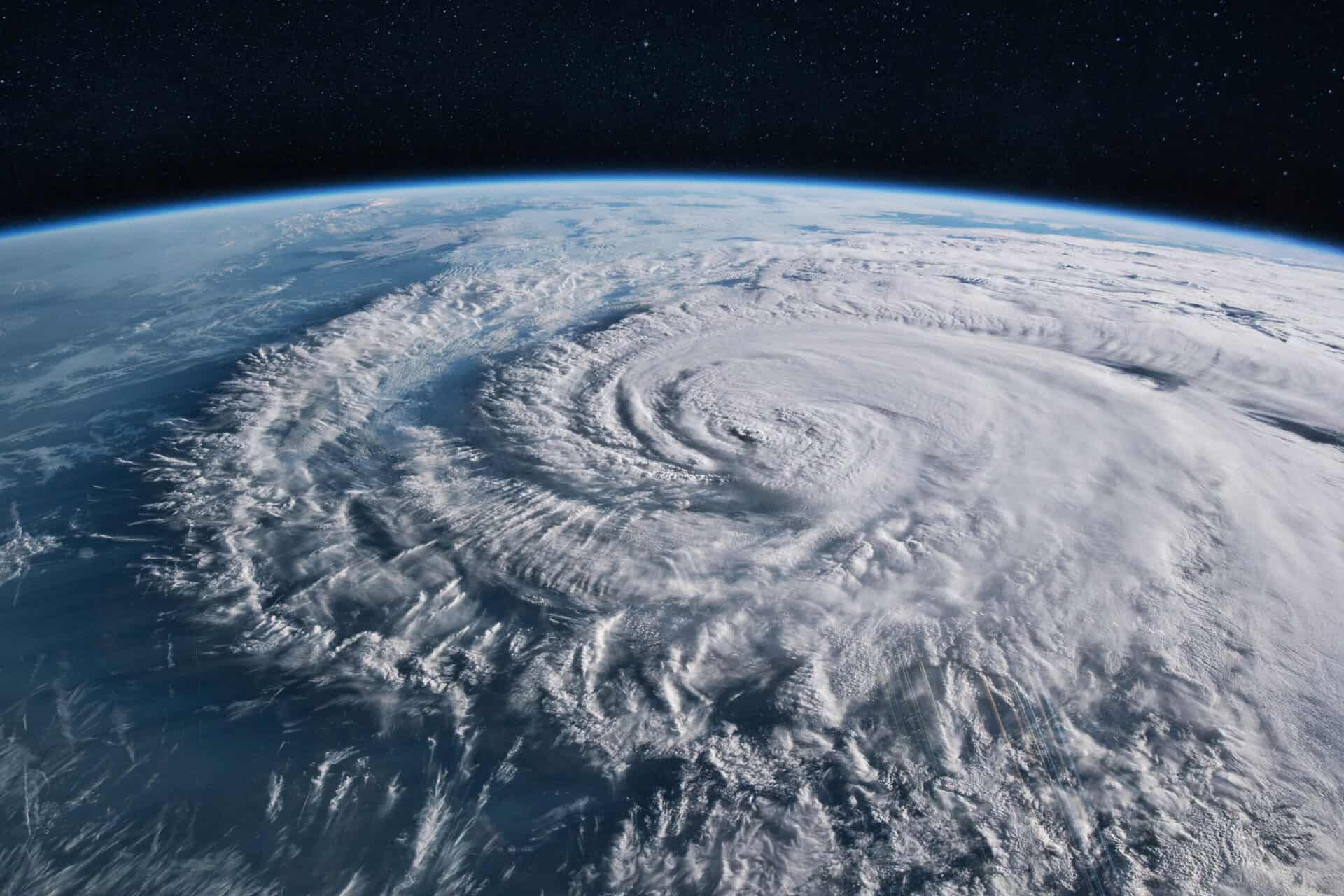 Earth from space showing a hurricane with flood risk implications.